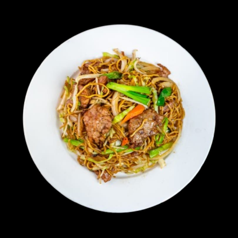 Canton Bistro's beef chow mein with noodles, beef, and mixed vegetables on a white plate.