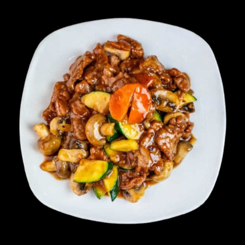 Canton Bistro's beef and mushroom stir-fry with zucchini and carrots in a rich brown sauce.