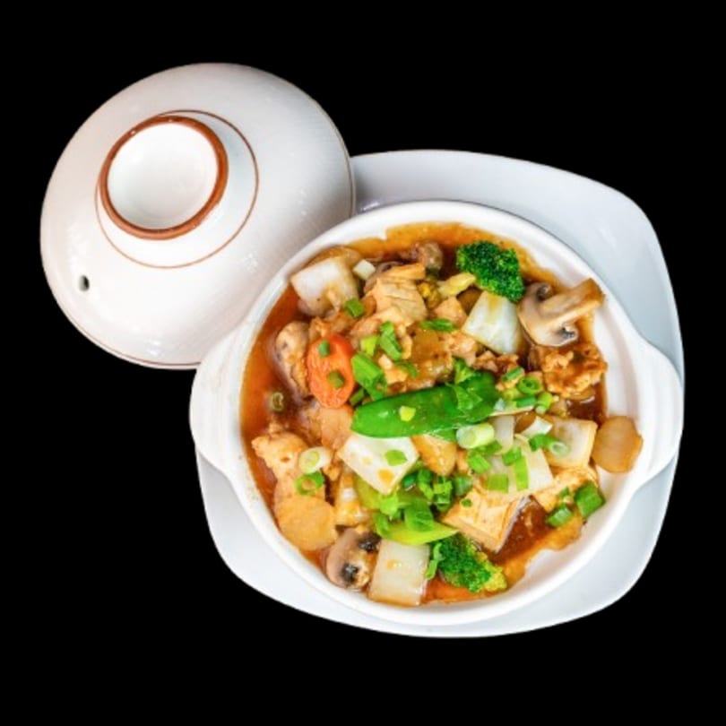Canton Bistro's hot pot with chicken, tofu, mushrooms, broccoli, and other vegetables.
