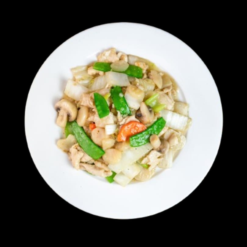 Canton Bistro's chicken with snow peas, mushrooms, and cabbage on a white plate.